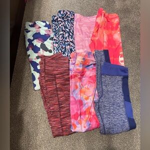 Girls lot of 7 pairs of athletic leggings. Size 10/12